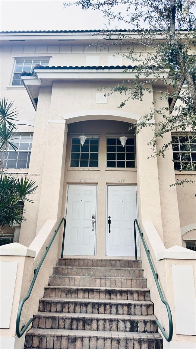 Building Photo - 5610 NW 114th Pl Unit 205