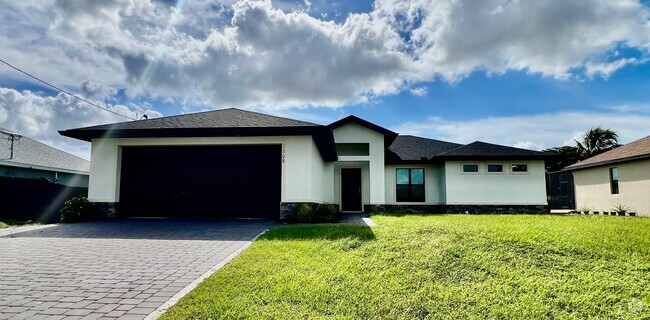 Building Photo - Cape Coral Gem: Stylish 3BR/2BA Home with ...