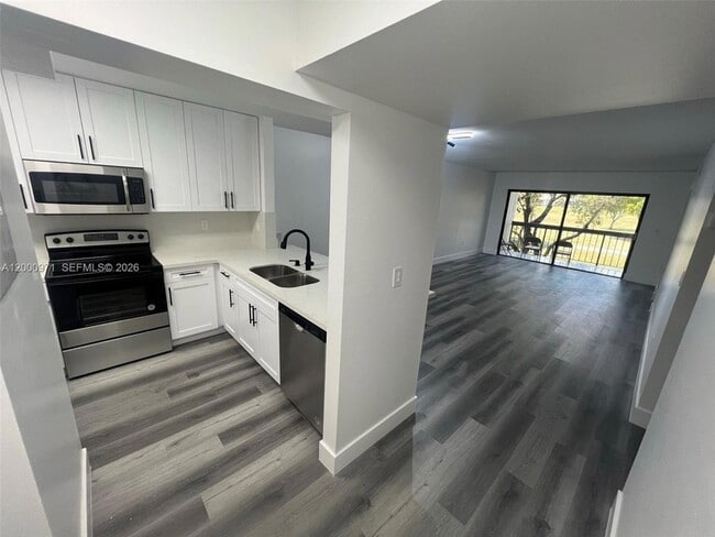 Building Photo - 10317 NW 9th St Cir Unit 202