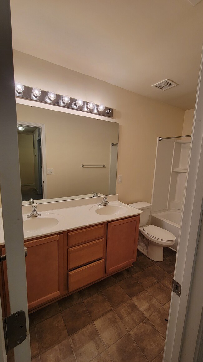 Photo - 6824 Creft Circle Unit Spacious 4BR Lake Park Townhome with Garage