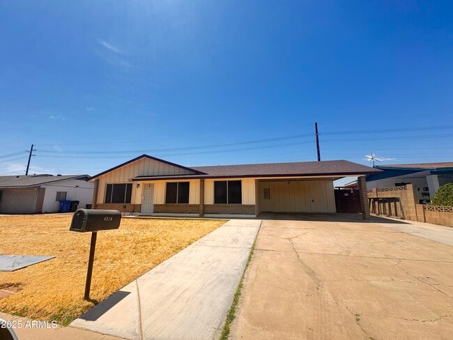 Building Photo - 4310 N 90th Dr Rental