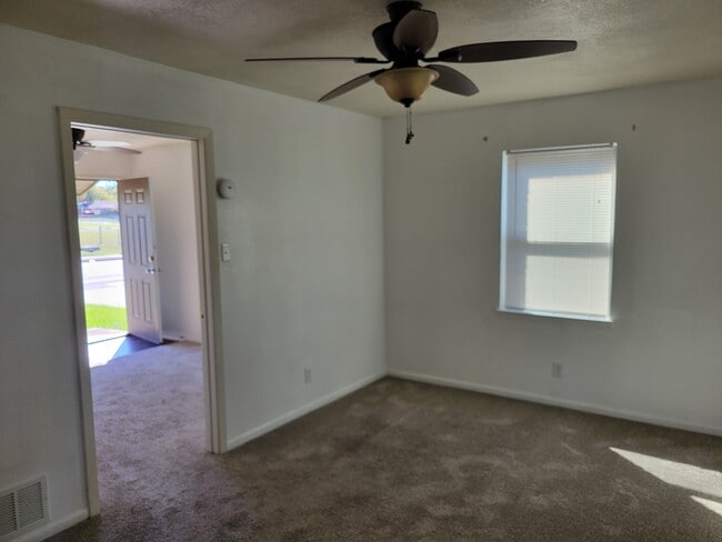 Bedroom toward livingroom - 1605 N W S Young Dr Unit A