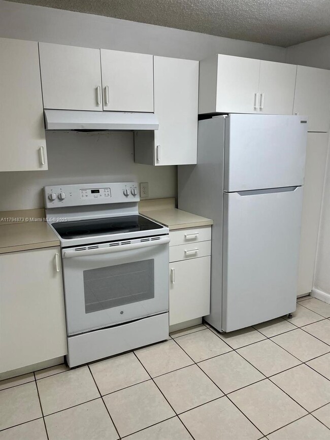 Photo - 9001 Wiles Rd Unit 103-3