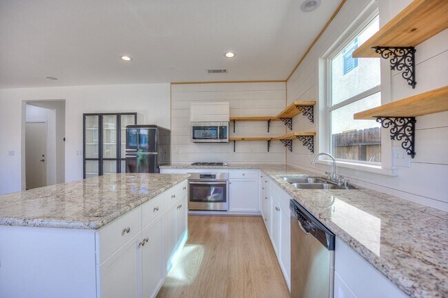 Photo - Spacious 3-Bedroom Home with a Backyard in Harlan Ranch Community!