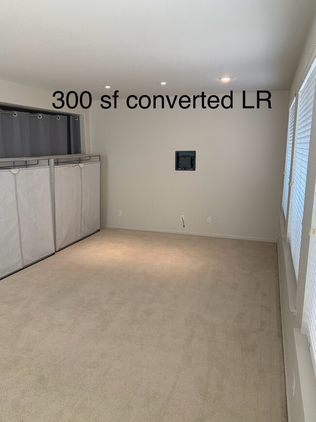 300 sq ft converted living room. - 1495 Breezeway Ct