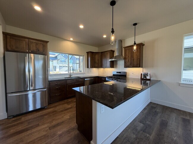 Photo - Lock-and-Leave Luxury Living — Lawn Care &...