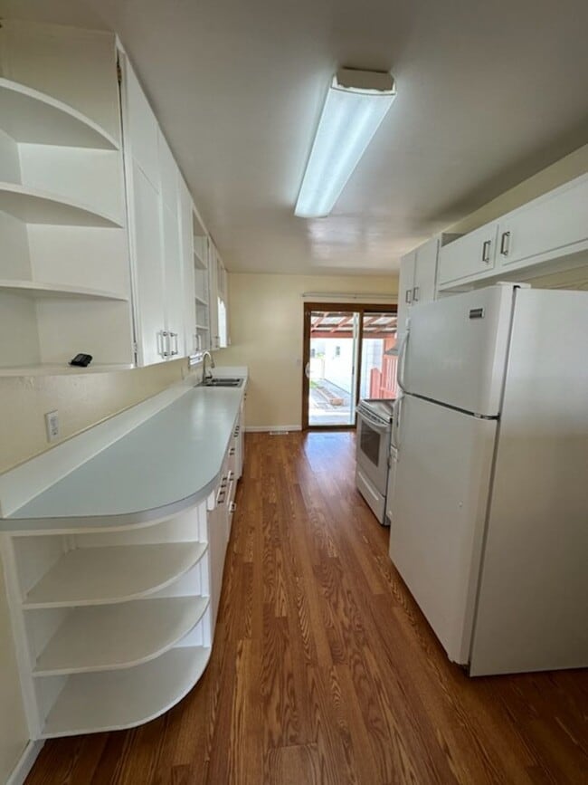 Photo - 2 Bedroom House on West End with Oversized Single Car Garage and Covered Back Patio