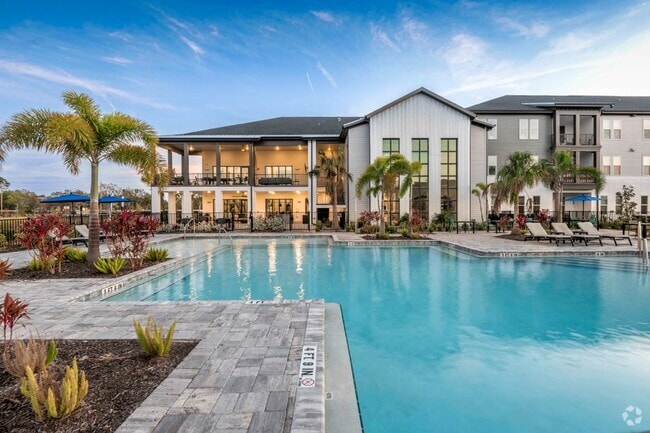 Building Photo - The Crossing at Palm Aire Rental