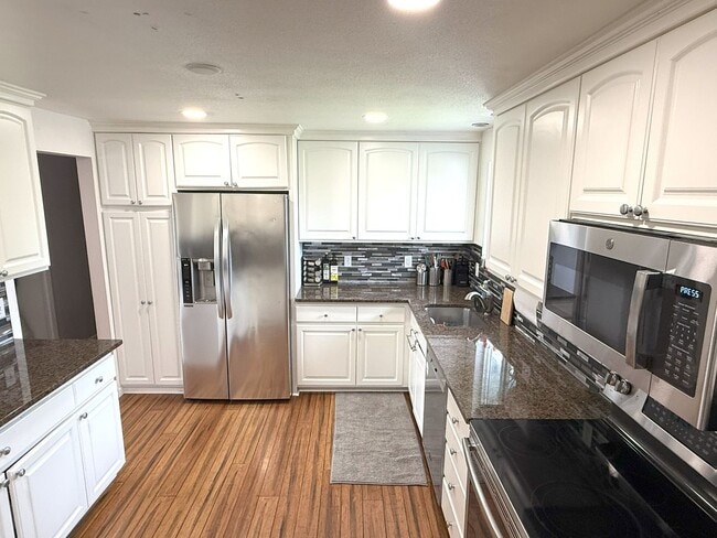 Photo - Stunning 4 BR / 3 BA West Beaverton Home with Private Oasis & Sport Court!