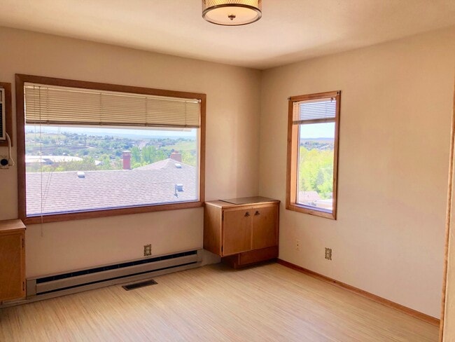 Photo - Charming North Hill Home with Beautiful Landscaping and Water Included!