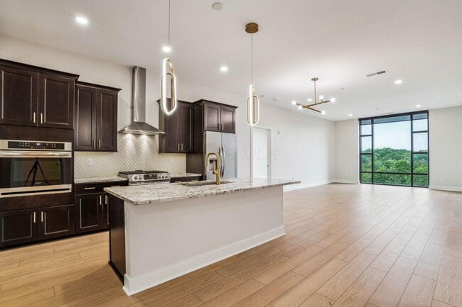 Building Photo - 6745 Longshore St Unit 404