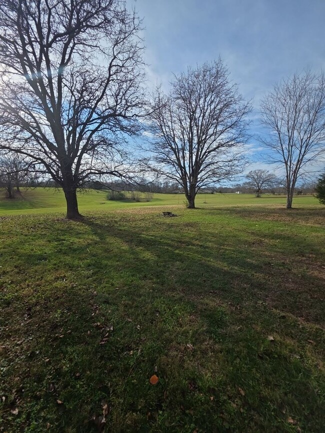 Photo - 2-Bedroom Handicap-Accessible Home with 3-Season Porch, Garage, and Large Yard