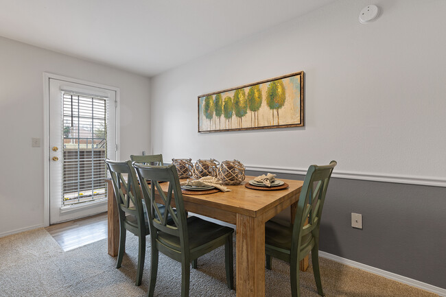 2BR/2BA Dining Area w/Patio Exit - Crown Pointe Apartments