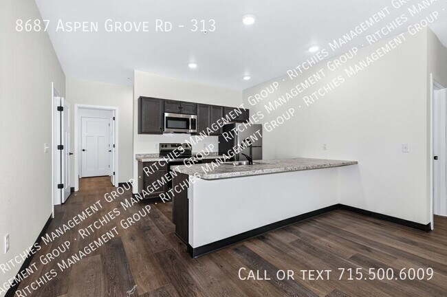 Photo - 8687 Aspen Ln Unit 313