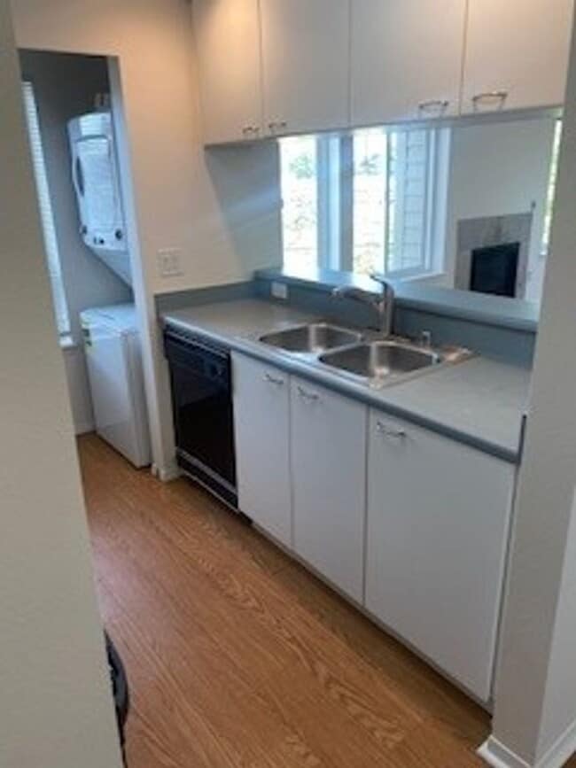 Photo - Queen Anne west facing 1 Bedroom patio secure building and garage Unit 201