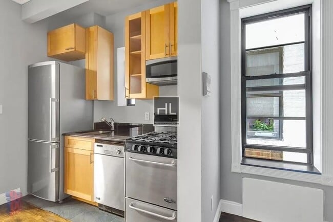 Photo - E 25TH ST. Unit 1A