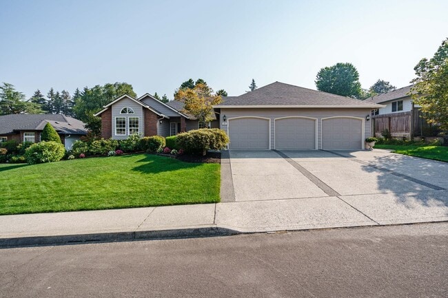 Photo - Beautifully Landscaped 1/4 acre with Well Maintained 4 bedroom 2 Bath Home with 3 Car Garage