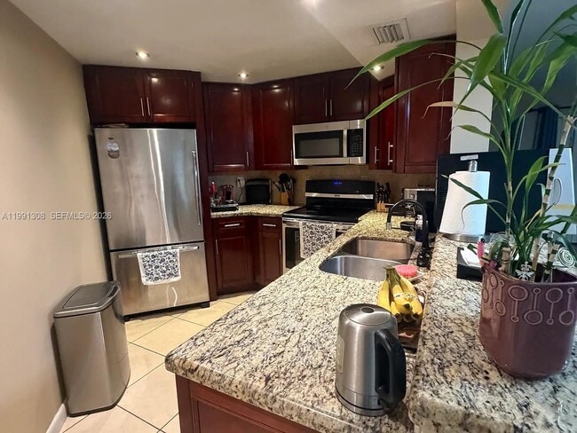 Building Photo - 9715 Fontainebleau Blvd Unit E213