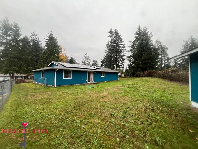 Photo - Remodeled rambler, no carpet, with HUGE fenced yard!!