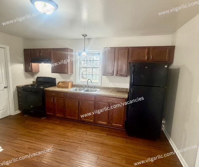 Building Photo - For rent - 4 Bedroom • 2 Full Bath • 2-Car Garage