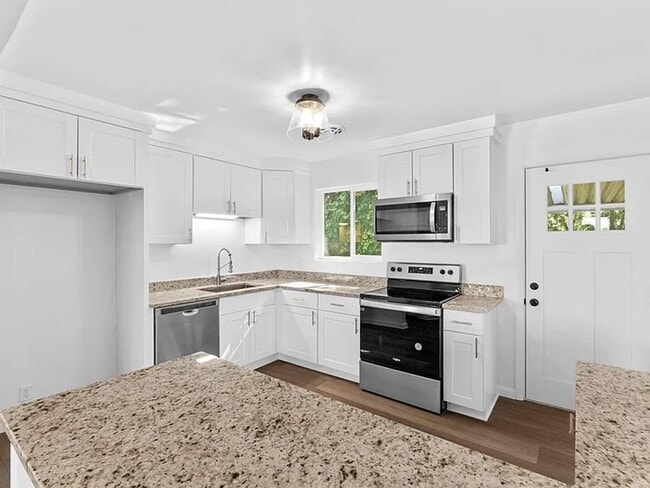 Photo - Renovated 4-Bedroom, 3-Bathroom Home in Millcreek