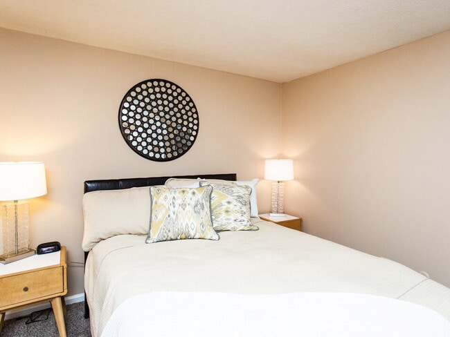 Primary Bedroom - Wake Robin Apartments