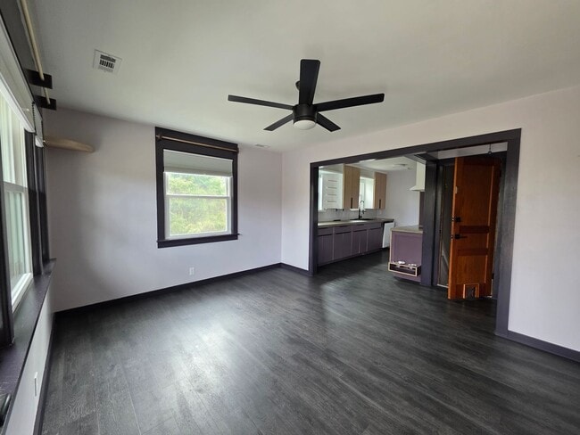 Photo - Charming 2BR with Walk-Out Basement, Fenced Yard & Flexible Murphy-Bed Office