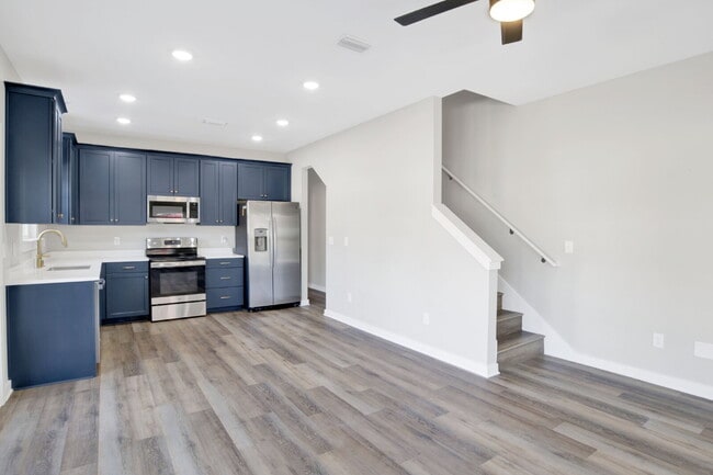 Photo - **Available now. This pet-friendly property features a small fenced yard with water and lawn main...