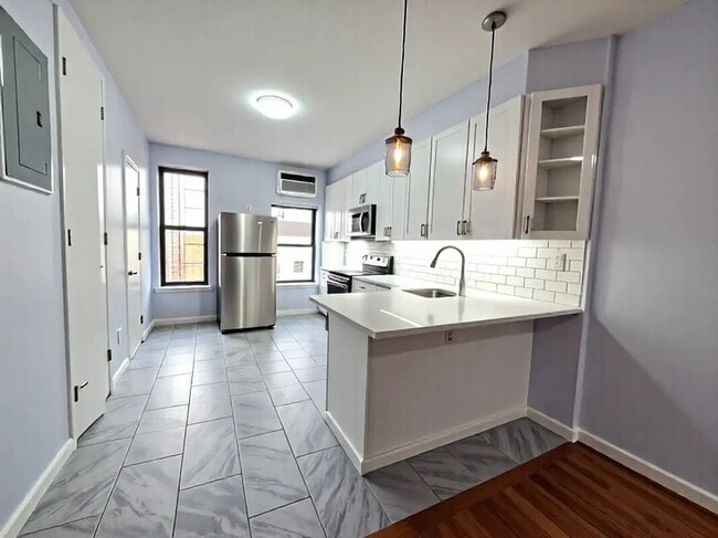 Building Photo - sunny, renovated, rent-stabilized one-bedroom apartment