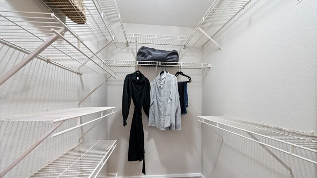 Blurb- Stay organized with a spacious walk-in closet featuring built-in shelving for effortless storage. Designed for style and convenience, it’s the perfect fit for your lifestyle.