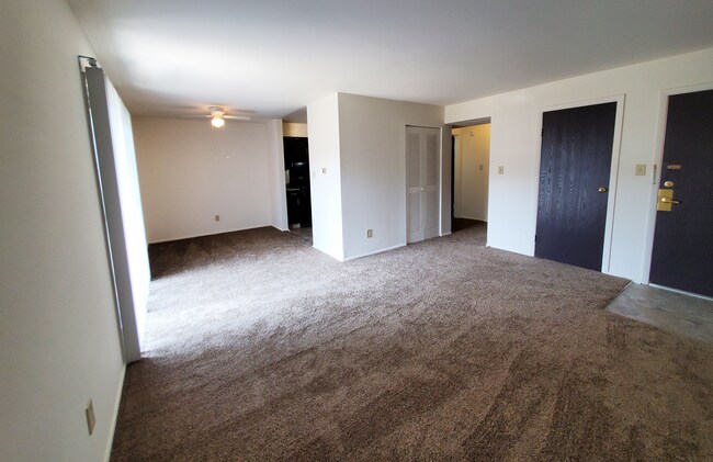 Living Room in the 1 Bedroom Apartment At Carriage House West