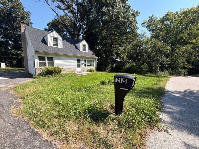 Photo - Spacious 4-Bedroom Home with Garage & Breezeway
