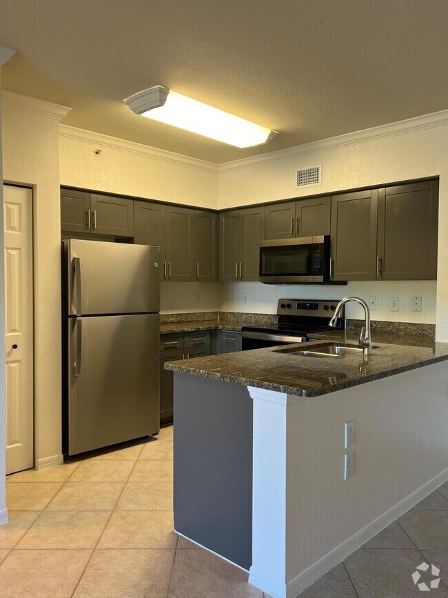 Building Photo - 6434 Emerald Dunes Dr Unit 302 Rental