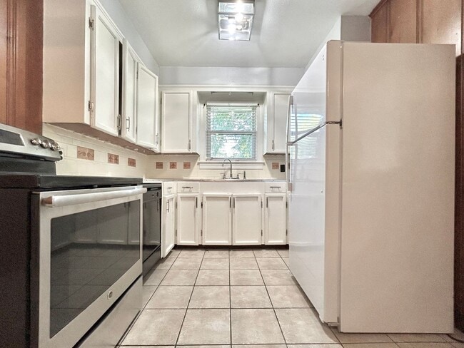 Photo - Charming Three Bedroom Home in a Highly Desirable Neighborhood