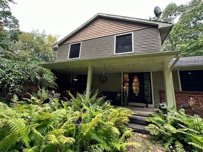 Photo - Dream Home in Highland, Michigan: Your Private Oasis on 5 Wooded Acres