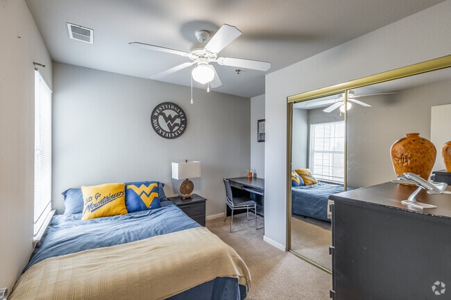 4BR, 2BA - 1,076SF - Bedroom - The Ridge