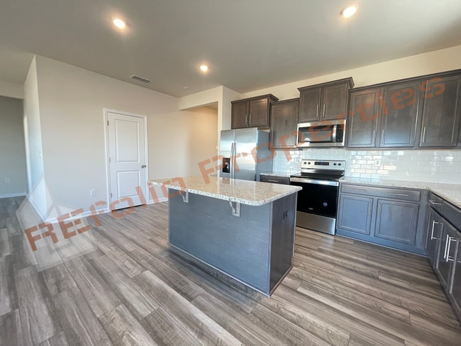 Photo - Beautiful Ranch-Style 4 Bedroom, 2 Bath Home – 2-Car Garage in West 540, Raleigh, Available Now!