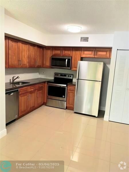 Building Photo - 3640 N 56th Ave Unit 416 Rental
