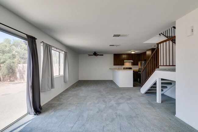 Building Photo - Double Primary Townhome with Spacious Backyard in 89115!