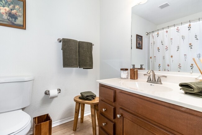 Discover a stylish bathroom designed for comfort and convenience, featuring sleek fixtures and tasteful accents.