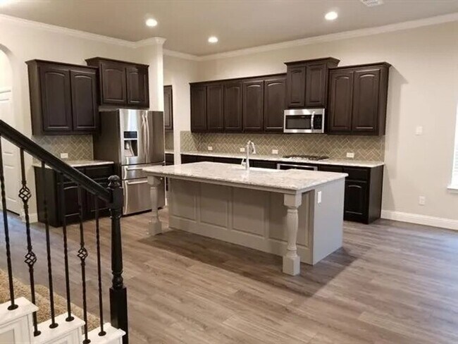 Photo - Coming Soon! 4BR/3.5BA | Updated Single Family Home | 2-Car Garage Parking | Fenced backyard