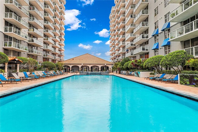 Building Photo - 5091 NW 7th St Unit 115