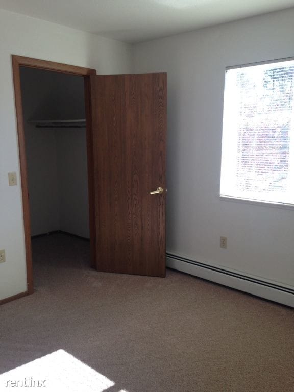 Bedroom with walk in closet - White Pine Manor