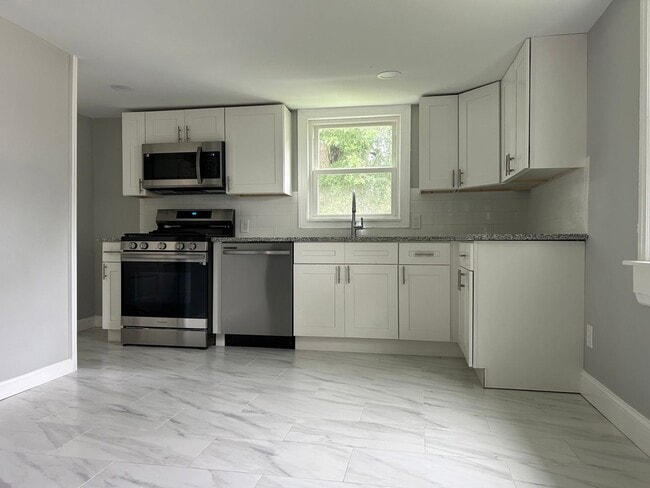 Photo - Beautifully Renovated 2-Bedroom House Featuring Extra Attic Storage