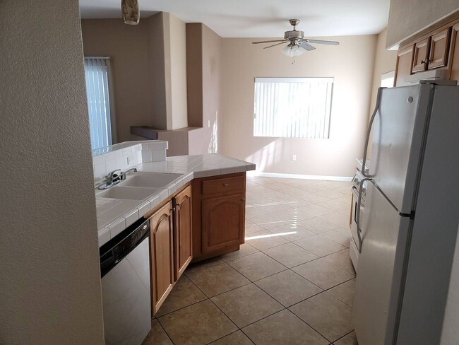 Photo - 2 story condo with 1 bedroom loft, 2 bathrooms and a 1 car attached garage.