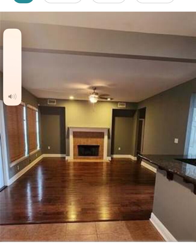 Fireplace, den with large windows. - 39152 Cajun Bayou Ave