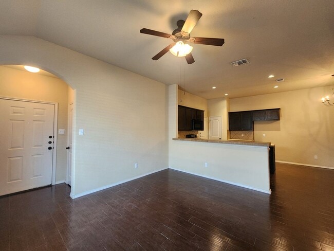 Photo - Wood Like Tile Flooring & Vinyl Plank - No Carpet / 1 Story Unit/ Fenced in Yard / Interior Washe...