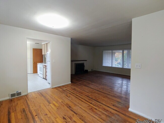 Photo - "Charming 2-Bed Retreat with Gleaming Hardwood Floors in Prime Seattle Location!"