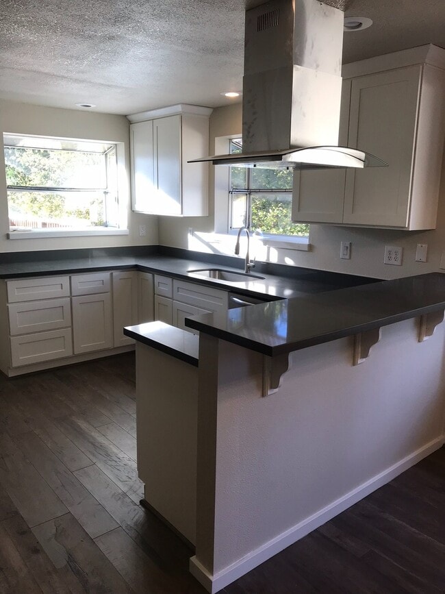 Photo - Remodeled 4 Bed Room 2 Bath 2 Car Garage Home