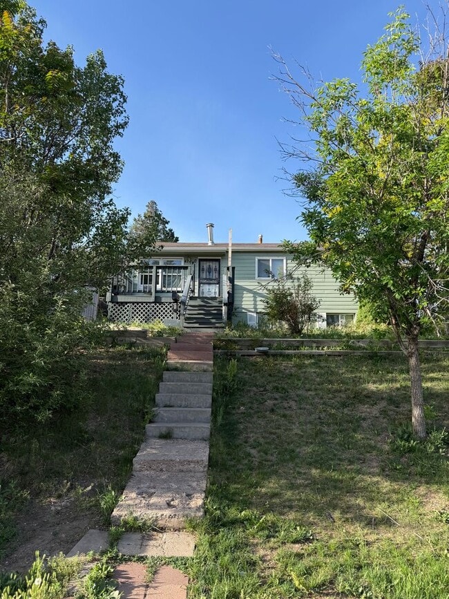 Building Photo - 4140 W Ellsworth Ave Unit B